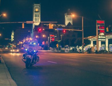 white police motorcycle park on road